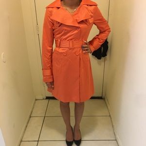 Belted orange trench jacket